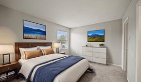 Temple apartment for rent - a bedroom with a bed and a dresser and a window