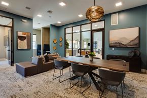 Charlottesville apartment for rent - a dining room with a wooden table and chairs