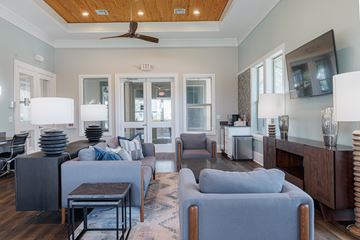 Pasadena apartment for rent - A living room with a grey couch and a wooden table.