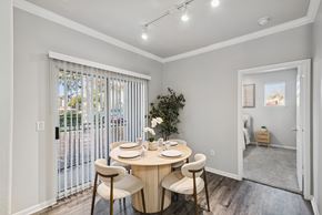 Stafford apartment for rent - A dining room with a round table and chairs.
