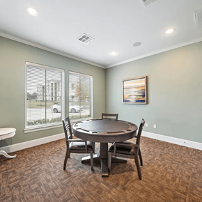 Montgomery apartment for rent - A dining room with a round table and chairs.