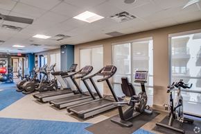 Tempe apartment for rent - an indoor gym with cardio equipment and exercise machines