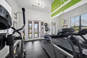 Waco apartment for rent - A gym with treadmills and elliptical machines.