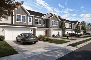 Moncks Corner townhouse for rent - A car is parked in front of a house with a person riding a skateboard in the driveway.