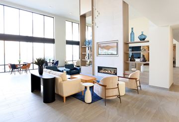 Lombard apartment for rent - A living room with a fireplace and a painting on the wall.