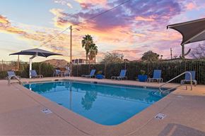 Tucson apartment for rent - Pool and sun deck at Zona Village Apartments in Tucson, AZ featuring pet-friendly apartments in West Foothills near Downtown Tucson