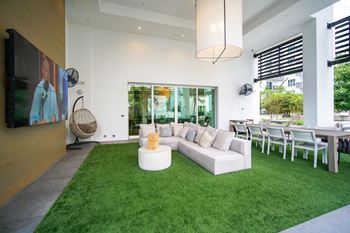 Refreshing outdoor pool with covered pool bar lounge