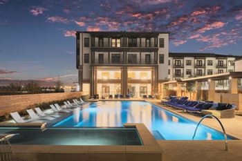 Resort-style pool with tanning deck