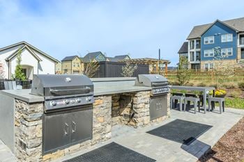 Barbecue grills with bar seating at poolside