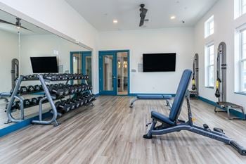24-Hour fitness center with latest cardio and strength equipment