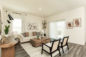 Rosharon apartment for rent - A living room with a couch, chairs, and a coffee table.