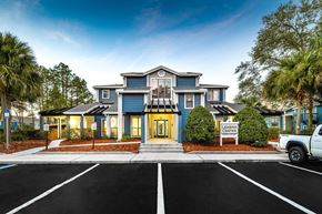 Jacksonville apartment for rent - A large building with a sign that says "LEGEND CENTER" in front of it.