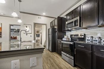 Granite counters in kitchens & bathrooms