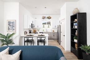 Casa Grande apartment for rent - A modern kitchen with a dining table and chairs.