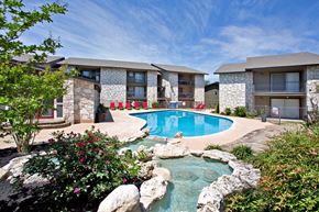 San Antonio apartment for rent - a swimming pool with a pool house and a resort style pool