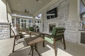 Poolside bbq area with tv & fireplace