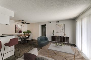 Longview apartment for rent - an open living room and dining room with a table and chairs