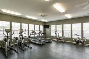 Antioch apartment for rent - a gym with cardio equipment and windows