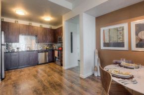 Denver apartment for rent - a kitchen and dining room with a table and chairs
