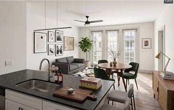 Rock Hill apartment for rent - A modern kitchen with a dining table and chairs.