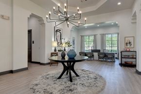San Antonio apartment for rent - A modern dining room with a large table and chairs.