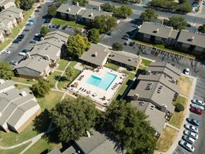 El Paso apartment for rent - an aerial view of a neighborhood of houses and a swimming pool