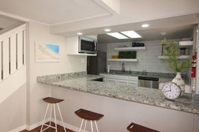 El Paso apartment for rent - a kitchen with a counter top and a clock