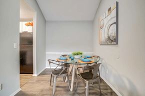 Jacksonville apartment for rent - a dining room with a table and chairs