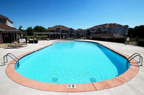 Antioch apartment for rent - a large swimming pool with apartments in the background