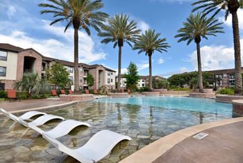 Resort style pool with tanning ledges