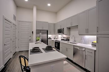 42” Custom cabinets with contemporary hardware