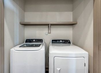 Full-size side-by-side or stackable washers/dryers included