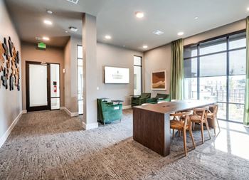 Business lounge with co-working hubs and private conference room