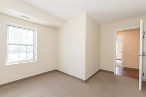 Waterloo apartment for rent - A room with a window and a door.