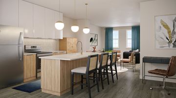 Merrillville townhouse for rent - A kitchen with a refrigerator, sink, and chairs.