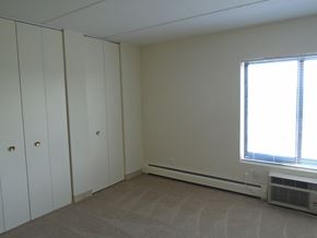 St Paul apartment for rent - Bedroom photo showing window and closed closet at John Snell Apartments