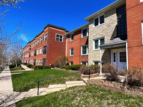 St Paul apartment for rent - a large brick building with a white door