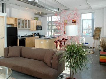 St Paul apartment for rent - a living room with a couch and a kitchen
