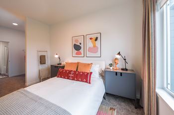 Bedroom with a bed and two night stands