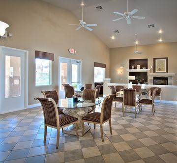 Las Vegas apartment for rent - A dining room with a checkered floor and a fireplace.