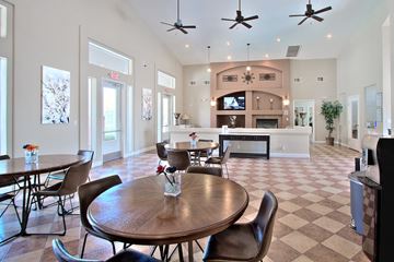 Las Vegas apartment for rent - a large living room with a dining room table and a kitchen