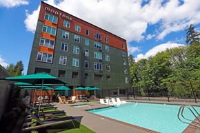 Tigard apartment for rent - A Montage hotel with a pool and lounge chairs.
