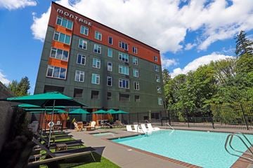 Tigard apartment for rent - A Montage hotel with a pool and lounge chairs.
