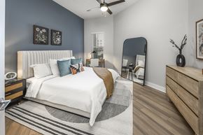 Winter Garden apartment for rent - A Bedroom with a Large Bed at The Haven at Lake Britt Apartments, Winter Garden, Florida