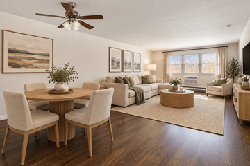 Eatontown apartment for rent - A living room with a dining table and chairs.