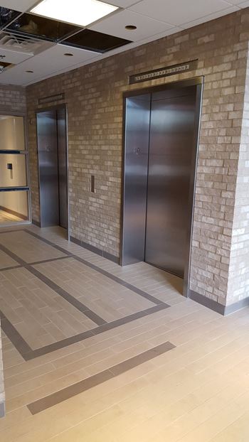 Two elevators in the lobby