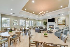 Antelope apartment for rent - Community clubhouse with dining and lounge areas at Sierra Creek Apartments, Antelope
