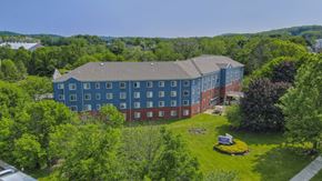 Wharton apartment for rent - Aerial view of colorful apartment complex with landscaping at Centennial Court Apartments, New Jersey
