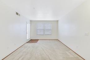 Elk Grove apartment for rent - Spacious bedroom with carpet and hardwood entry at Renwick Square Apartments, California, 95758