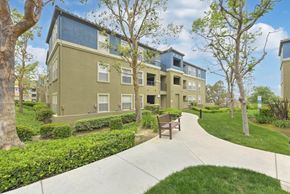 Anaheim Hills apartment for rent - Walkway and bench at Overlook at Anaheim Hills Apartments, Anaheim Hills, CA, 92808